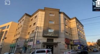 مجمع تجاري وشقق فندقية: (الجبيهة، شارع البلدية).